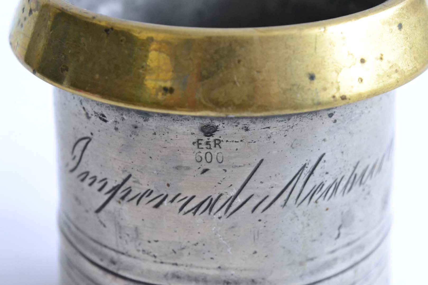 Half Pint Pewter Measure with a Brass Rim