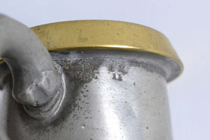 Half Pint Pewter Measure with a Brass Rim
