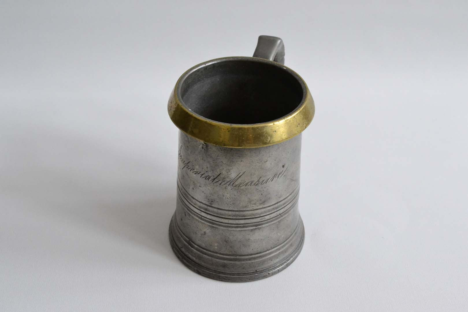 Quart Pewter Measure with a Brass Rim
