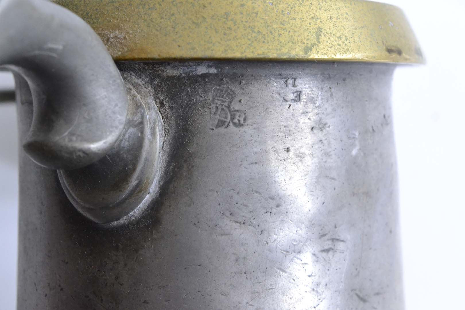 Quart Pewter Measure with a Brass Rim