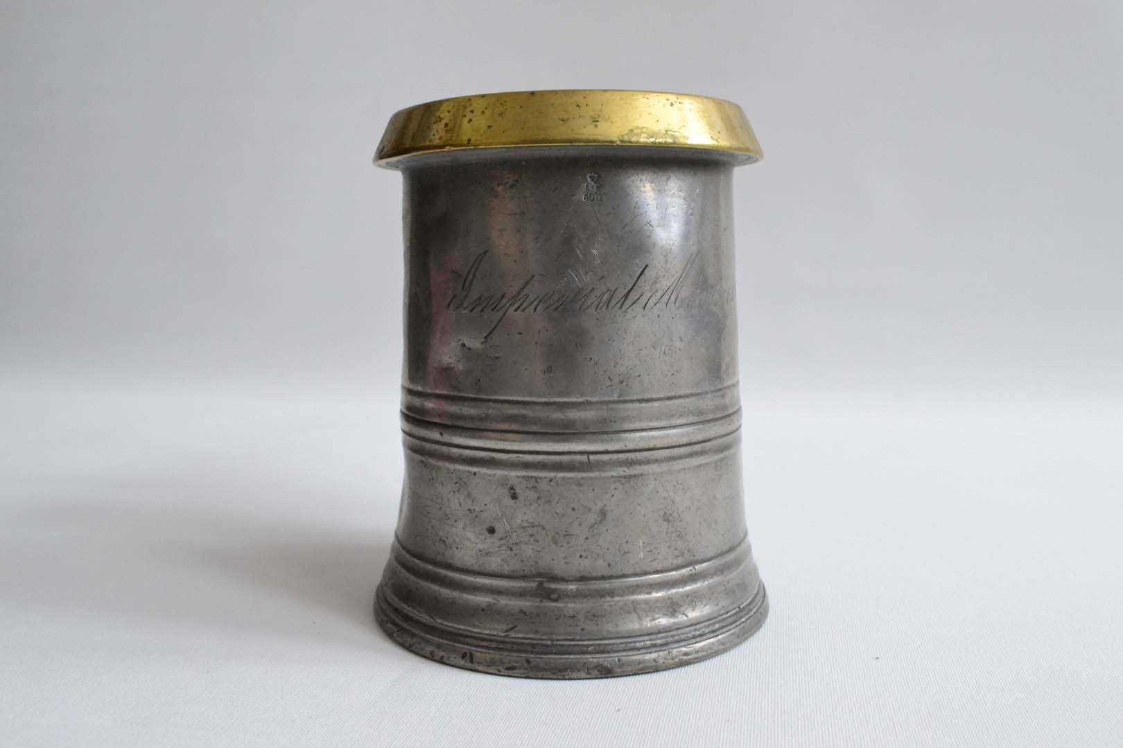 Quart Pewter Measure with a Brass Rim