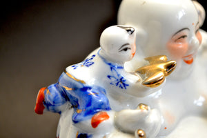 Porcelain Laughing Buddha Figure with Five Children