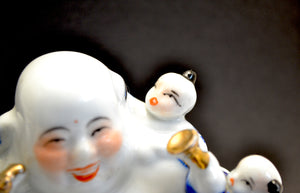 Porcelain Laughing Buddha Figure with Five Children